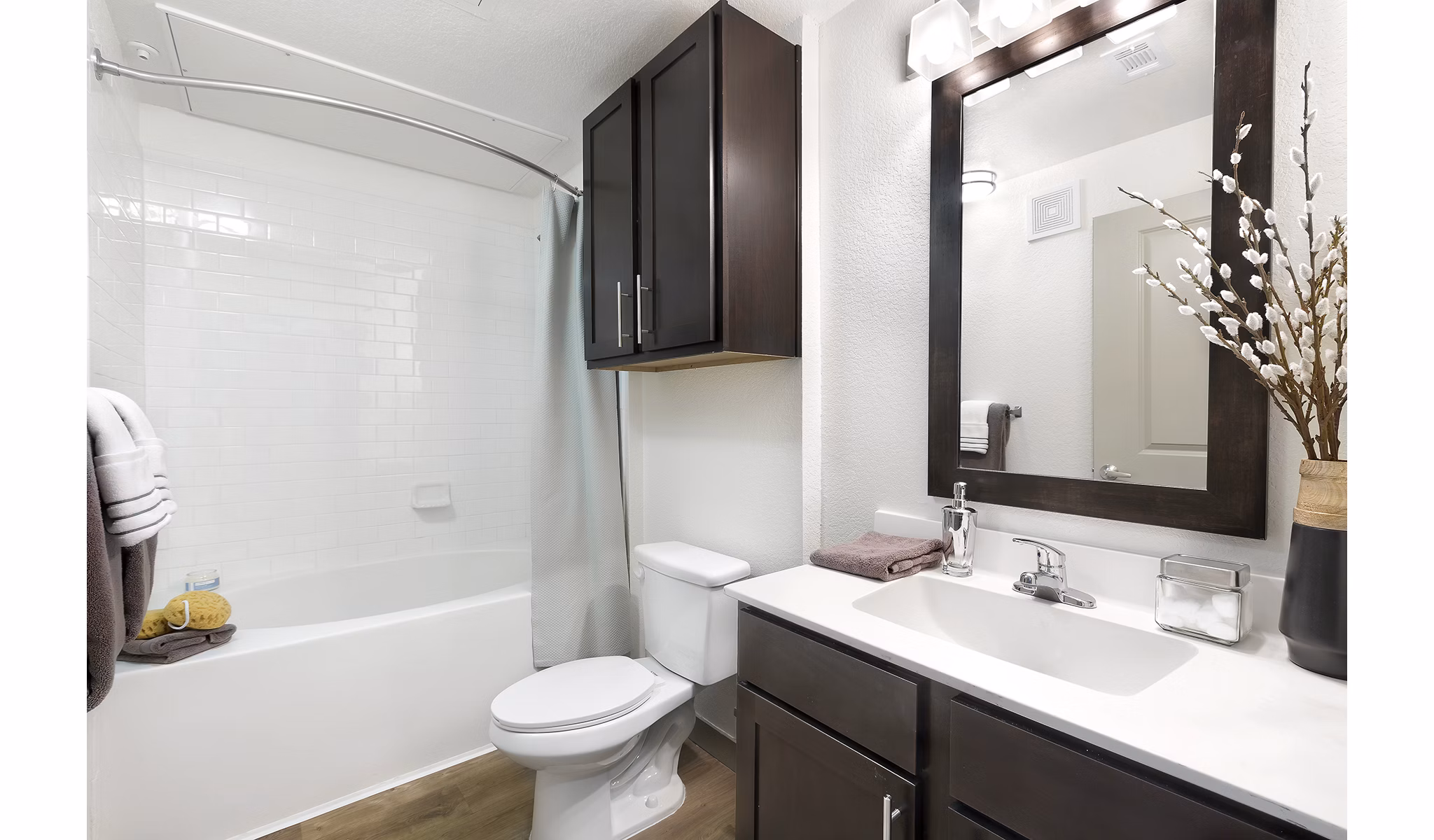 Modern bathroom with sleek fixtures at West Koenig Flats Apartments in Austin