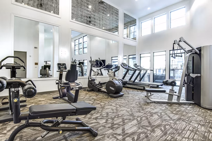 State-of-the-art fitness center with modern equipment at West Koenig Flats Apartments, ideal for an active lifestyle