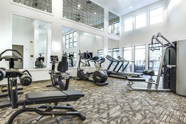 fitness center at West Koenig Flats Apartments