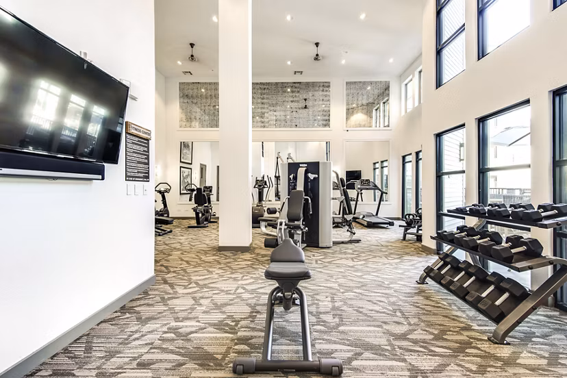 State-of-the-art fitness center with modern equipment at West Koenig Flats Apartments