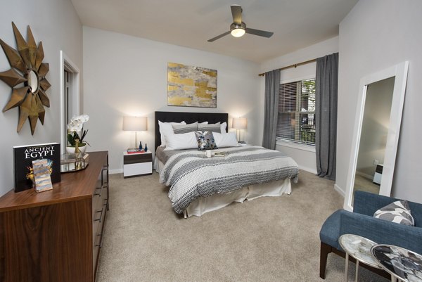 Cozy bedroom featuring elegant decor at Overture Buckhead South Apartments