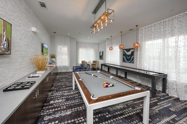Clubhouse with modern design and seating areas at Overture Buckhead South Apartments