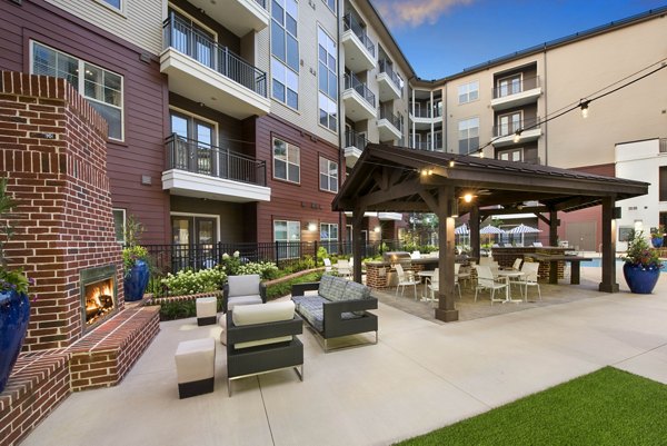 Inviting patio area with comfortable seating at Overture Buckhead South Apartments