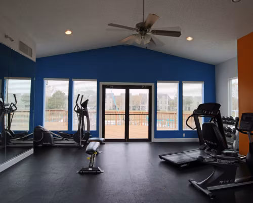Fitness center with modern equipment at CP Waterfront Apartments, offering a luxury workout experience for residents