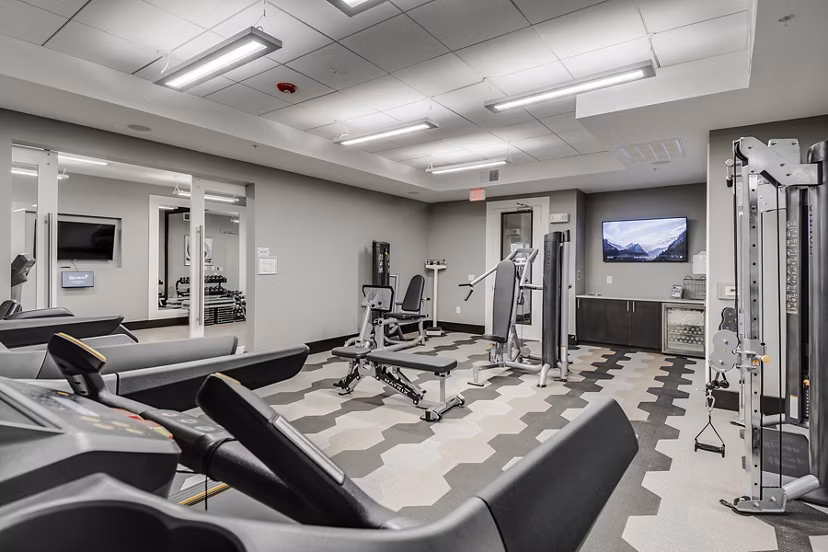 Modern fitness center featuring state-of-the-art equipment at Overture Stone Oak luxury apartments