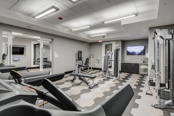 Modern fitness center featuring state-of-the-art equipment at Overture Stone Oak luxury apartments