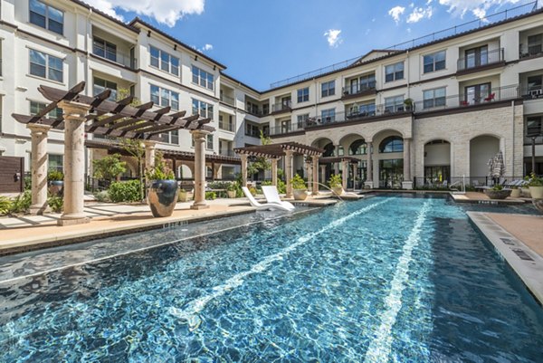 Resort-style pool with cabanas at Overture Stone Oak apartments