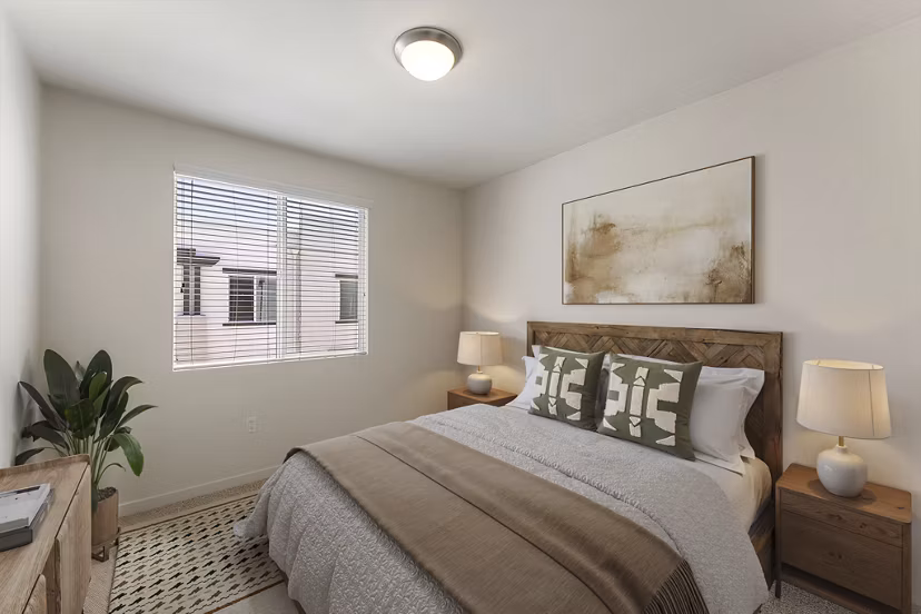 Elegant bedroom with contemporary furnishings at Solaire Apartments, a Greystar luxury community