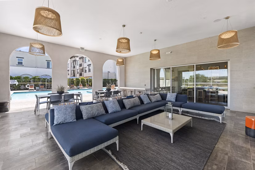 Clubhouse with modern design and cozy seating at Solaire Apartments