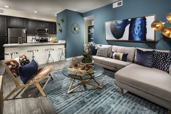 Spacious living room with contemporary design elements at Solaire Apartments