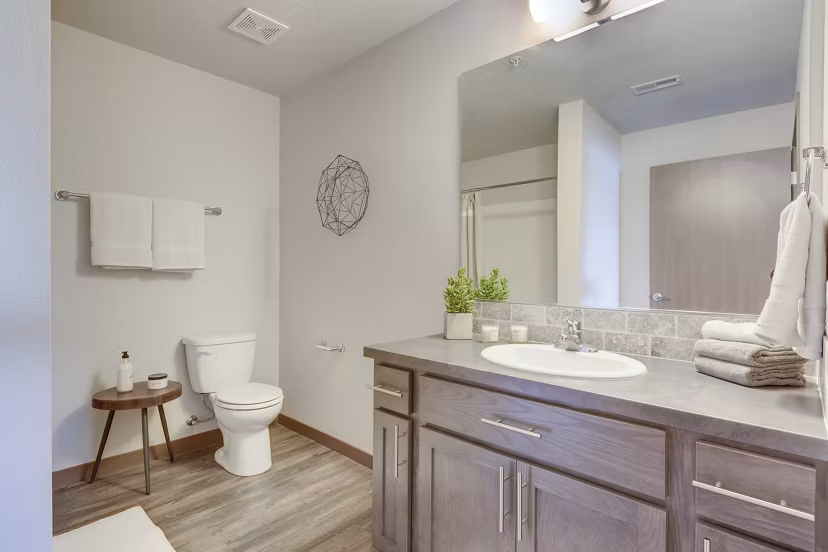 Modern bathroom with sleek fixtures at Bella Tess Apartments