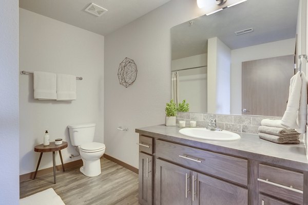 Modern bathroom with sleek fixtures at Bella Tess Apartments