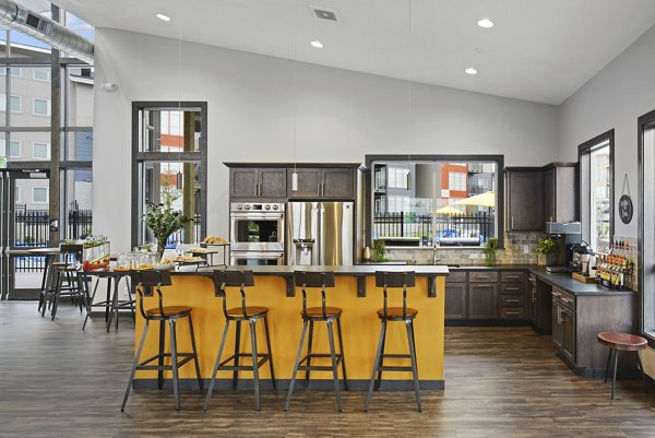 Stylish clubhouse with modern amenities at Bella Tess Apartments, perfect for social gatherings and relaxation