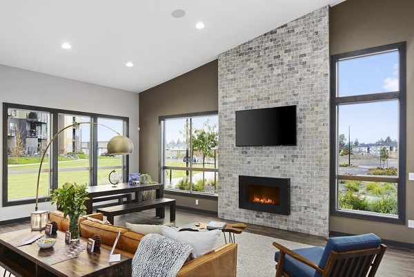 Clubhouse featuring modern design and cozy seating at Bella Tess Apartments