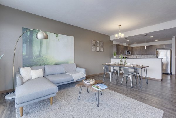 Spacious living room with modern decor in Bella Tess Apartments suitable for luxury lifestyle