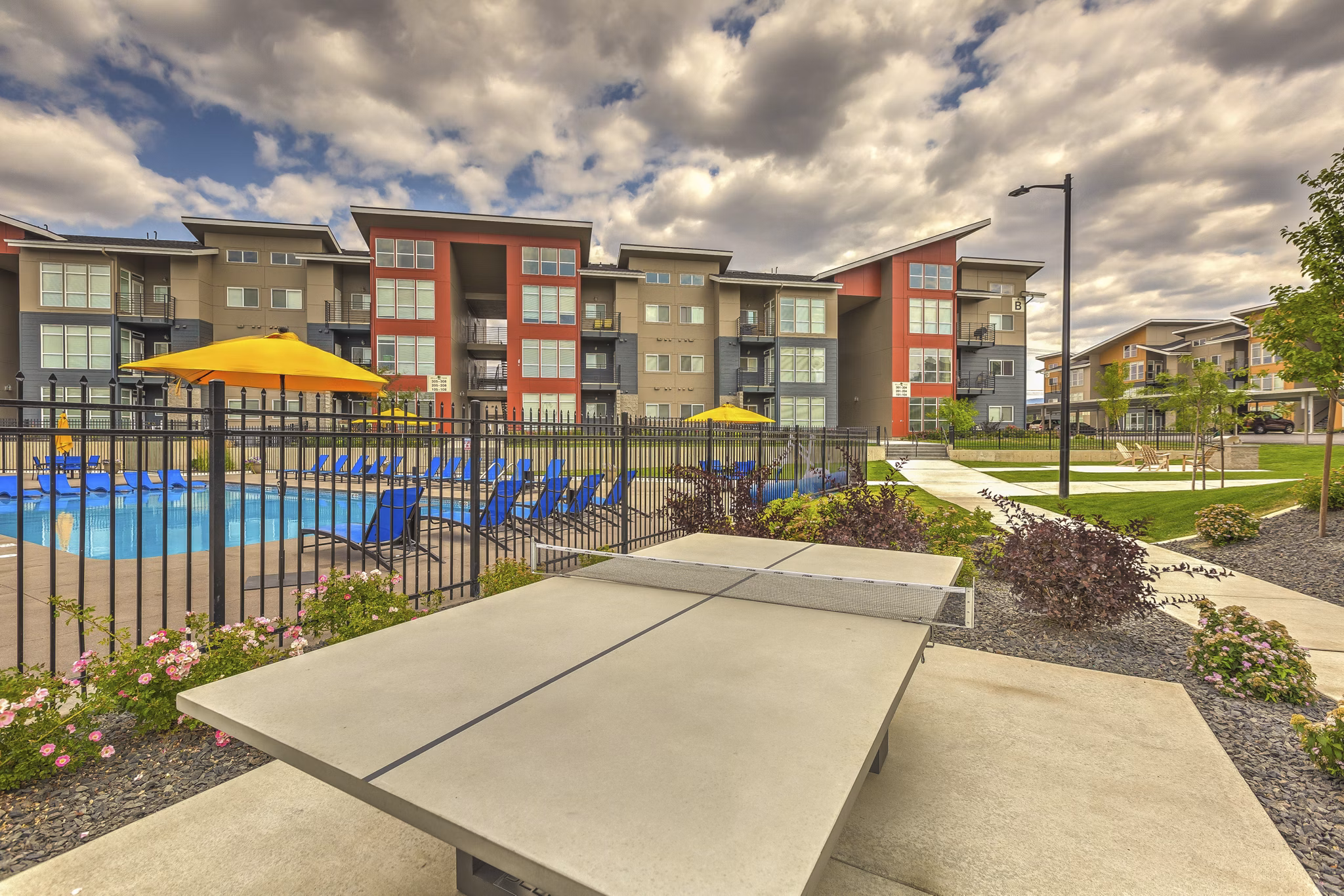 Sport court with basketball hoops at Bella Tess Apartments