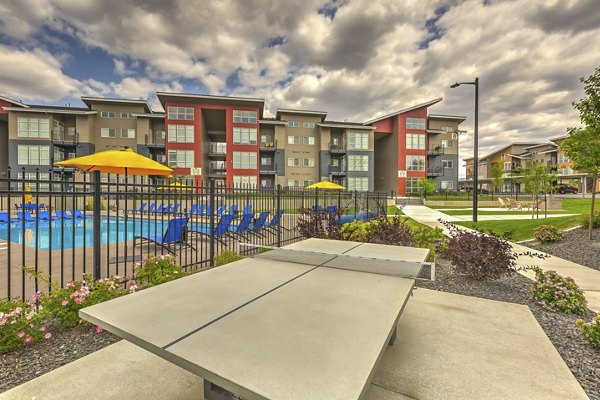 Sport court with basketball hoops at Bella Tess Apartments