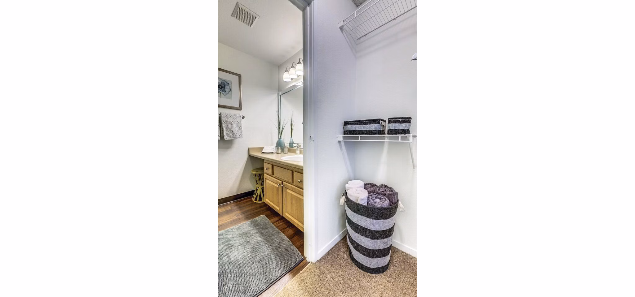 Bedroom closet with sleek shelving and ample storage space in Onyx Apartments, a luxury Greystar property