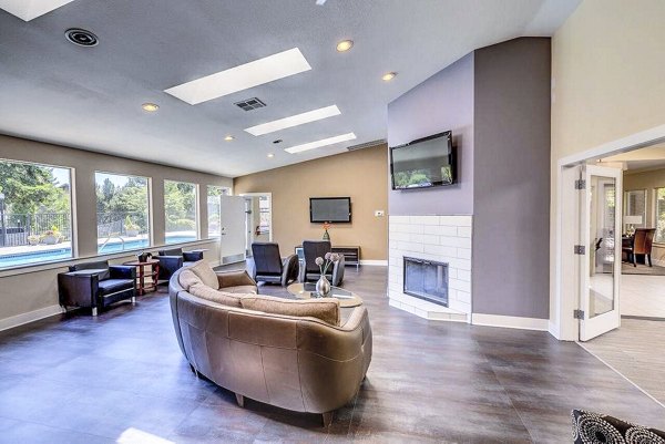Stylish community clubhouse featuring modern design and comfortable seating at Onyx Apartments