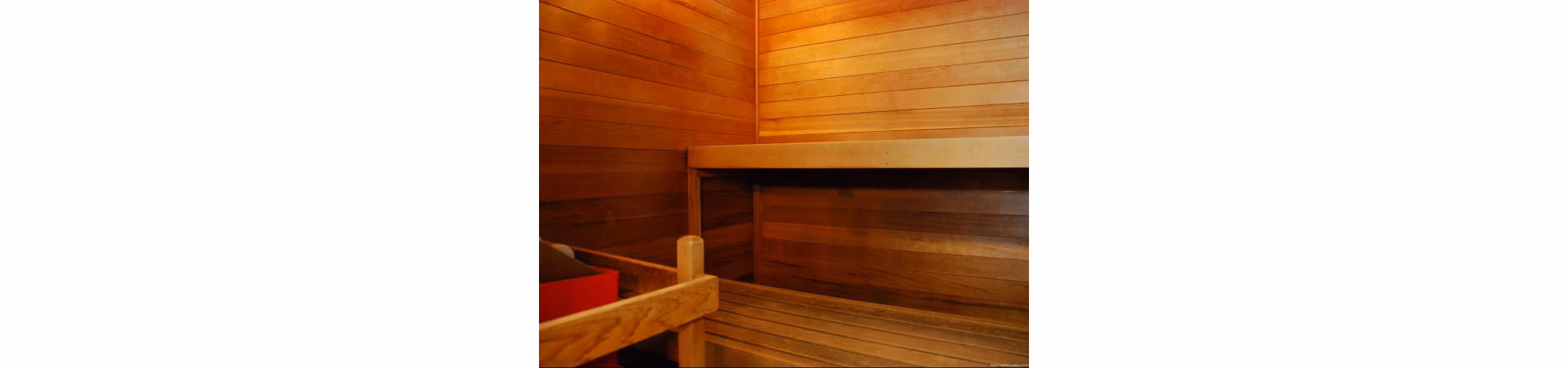 Luxurious indoor sauna at Onyx Apartments, enhancing relaxation and wellness