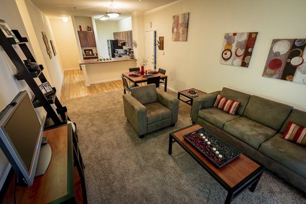 living room at Outpost at Waco Apartments