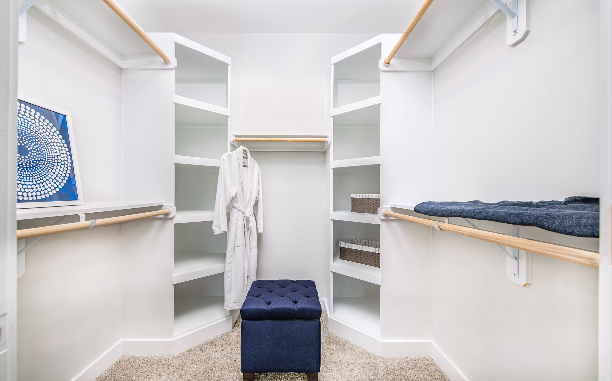 Spacious bedroom closet with ample shelving in Overture Crabtree Apartments
