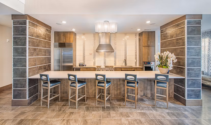 Clubhouse with modern design elements at Overture Crabtree Apartments Perfect space for socializing and relaxation in luxury living environment
