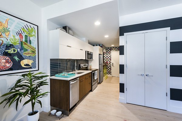 Modern kitchen with sleek appliances in Greystar luxury apartments