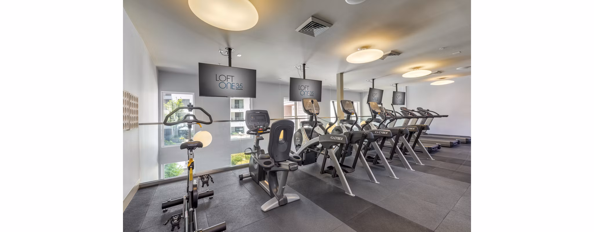 fitness center at Loft One35 Apartments