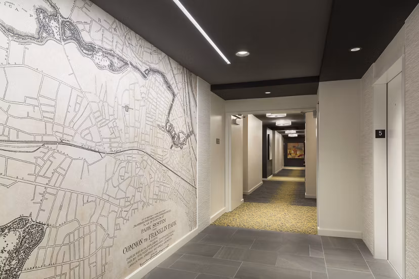 Contemporary hallway with modern lighting at Serenity Apartments, featuring luxury design at Greystarâ€™s exclusive community