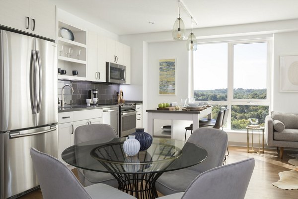 Dining area featuring modern table and chairs at Serenity Apartments, Greystar luxury apartments