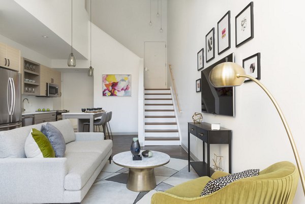 Modern living room with stylish decor at Serenity Apartments