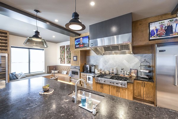 clubhouse kitchen at Overture Highlands Apartments