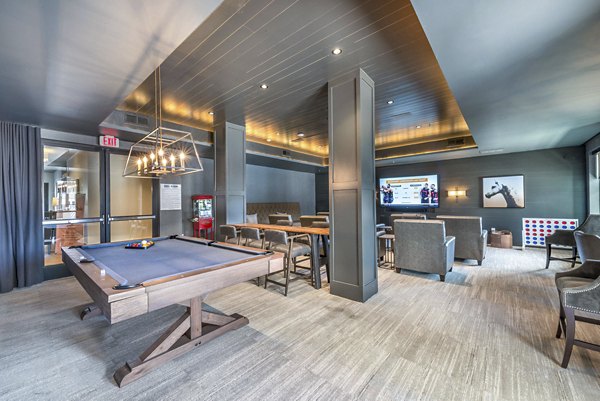 clubhouse game room at Overture Highlands Apartments