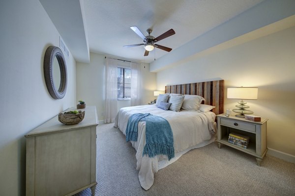 Cozy bedroom with modern decor at Solle Davie Luxury Apartments
