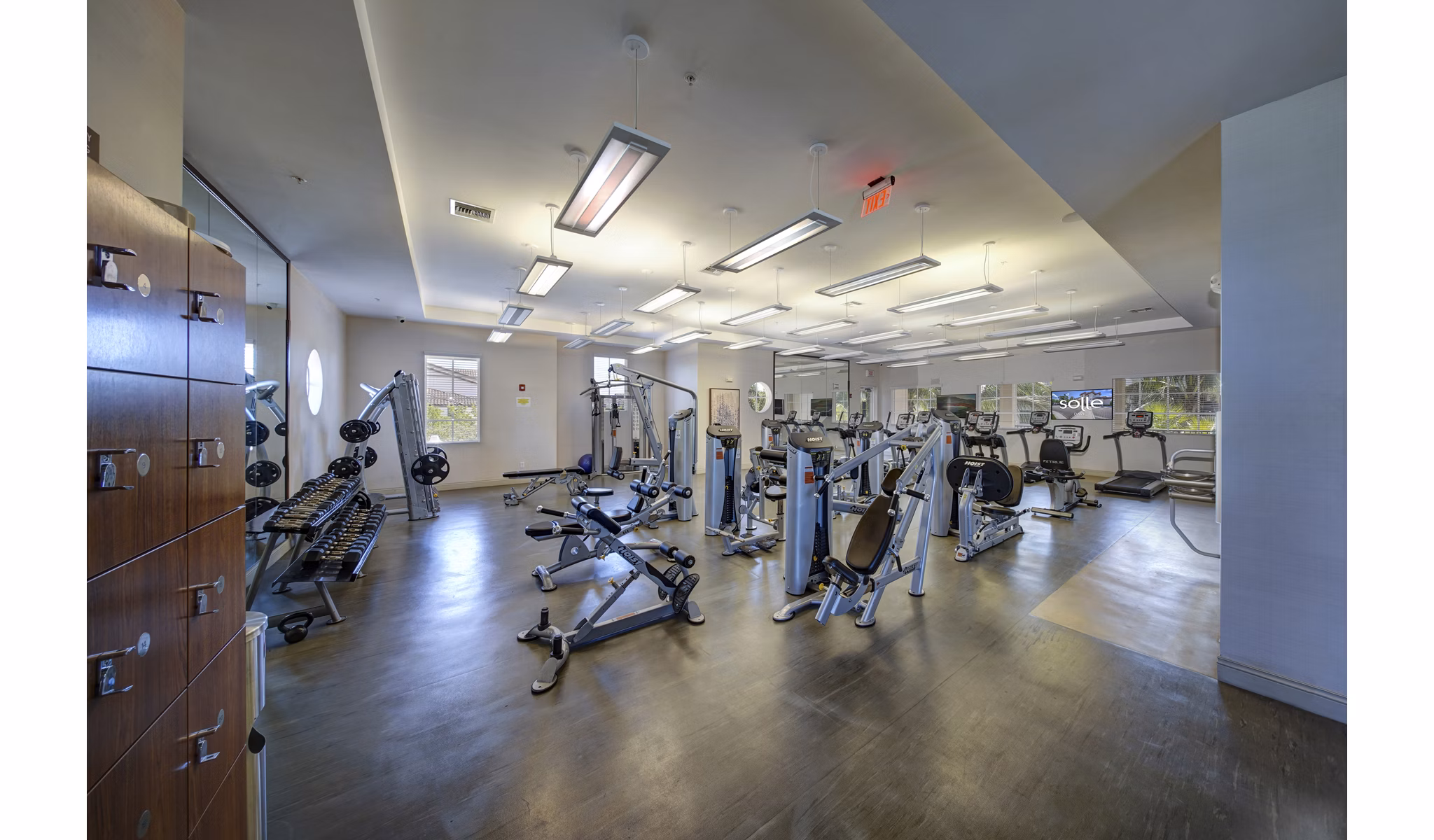 State-of-the-art fitness center with modern equipment at Solle Davie Luxury Apartments