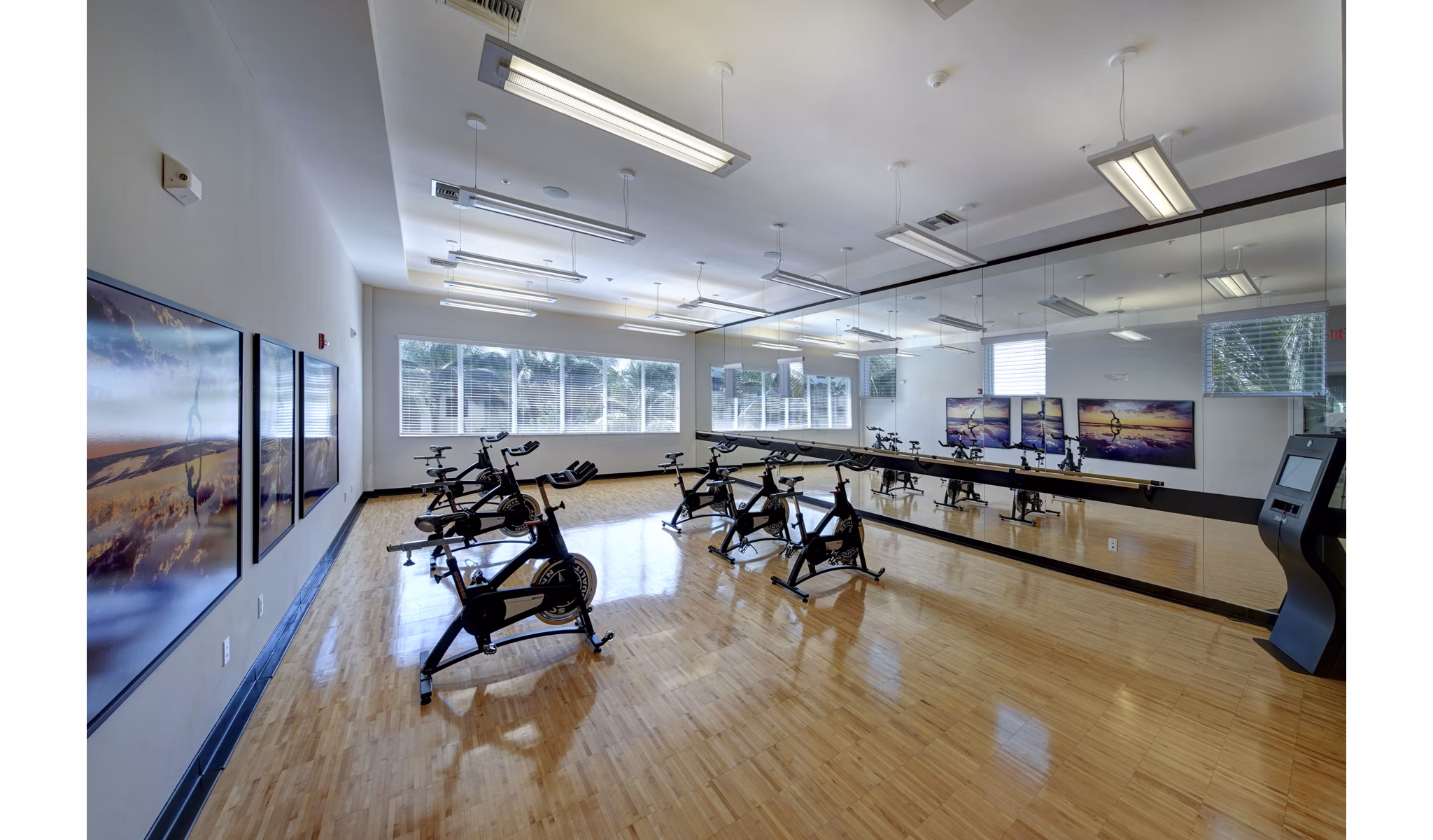 Spacious yoga/spin studio with modern equipment at Solle Davie Luxury Apartments, perfect for fitness enthusiasts seeking luxury living