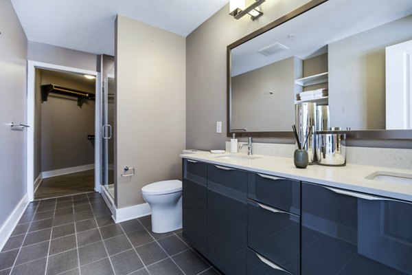 Modern bathroom with sleek fixtures at Ascent Uptown Apartments, luxury living in vibrant surroundings