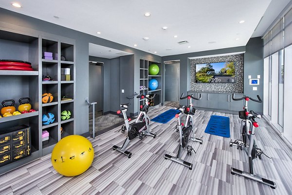 fitness center at Ascent Uptown Apartments