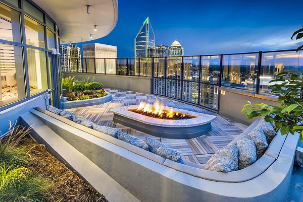 Private balcony with stunning skyline views at Ascent Uptown Apartments