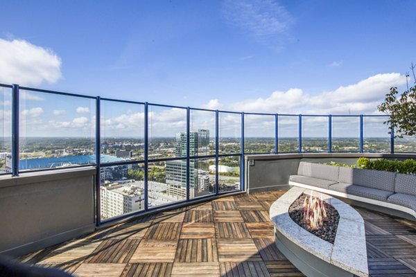 Cozy fire pit at Ascent Uptown Apartments ideal for social gatherings and relaxation in a luxury community setting