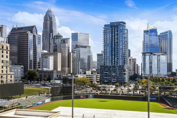 Ascent Uptown Apartments: Stunning downtown view from luxury high-rise balcony