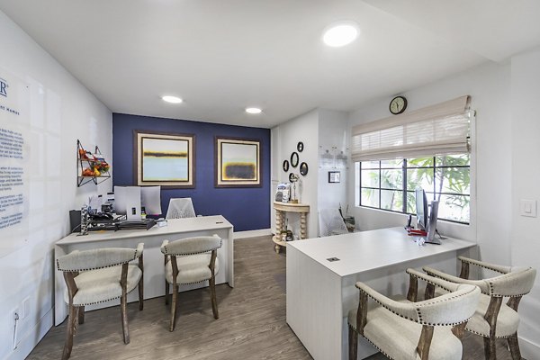 Business center equipped with modern workstations at Overture San Marcos Apartment Homes