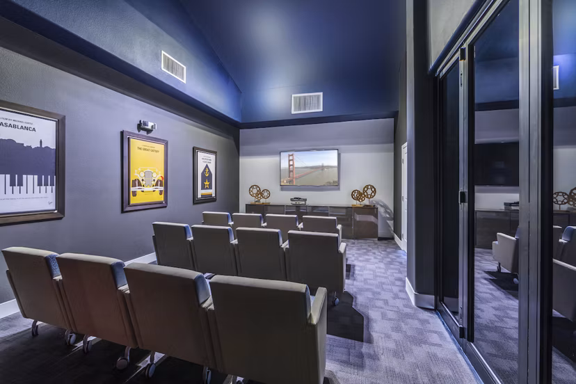 Theater room featuring plush seating at Overture San Marcos Apartment Homes for luxury entertainment