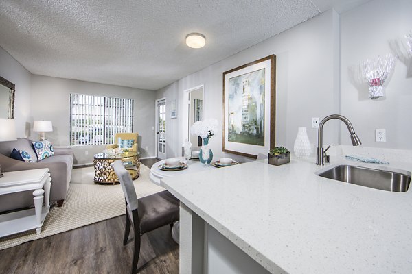 Dining room with stylish decor and modern lighting at Overture San Marcos Apartment Homes