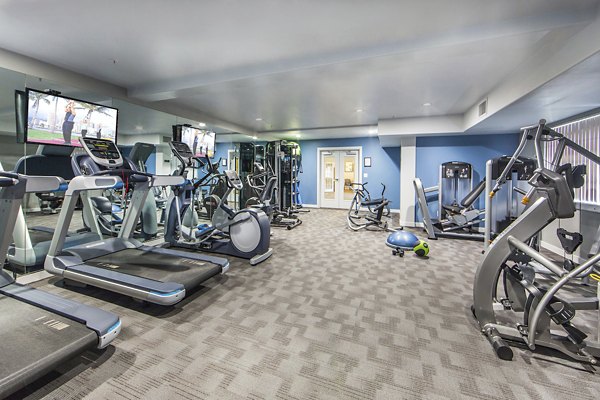 Modern fitness center with state-of-the-art equipment at Hacienda Vallecitos Apartments