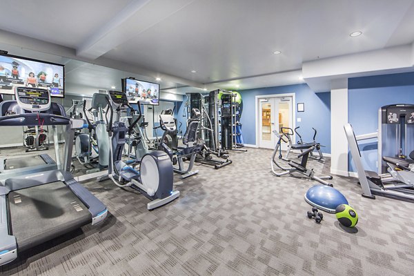Modern fitness center with state-of-the-art equipment at Hacienda Vallecitos Apartments for luxury living