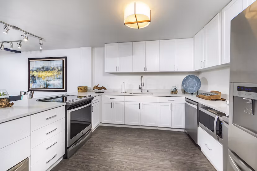 Elegant kitchen with modern appliances at Overture San Marcos Apartment Homes