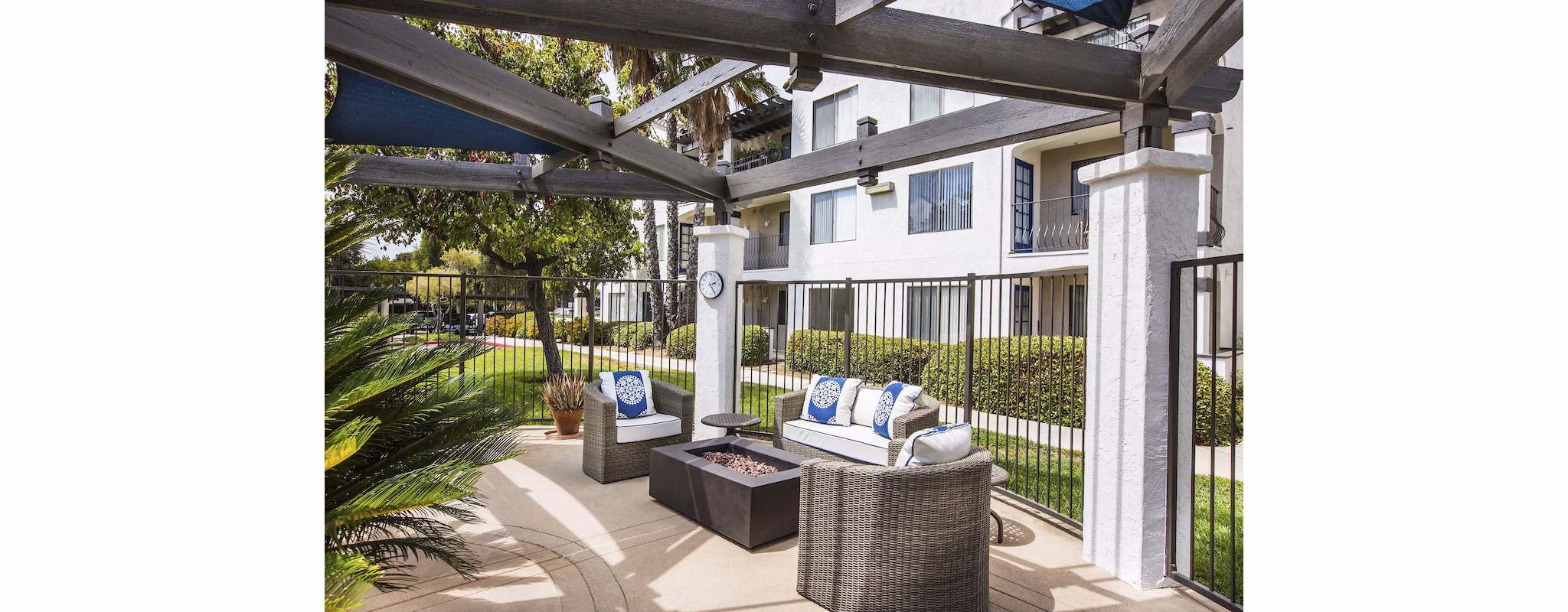 Cozy patio with modern seating at Overture San Marcos Apartment Homes