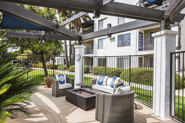 Cozy patio with modern seating at Overture San Marcos Apartment Homes